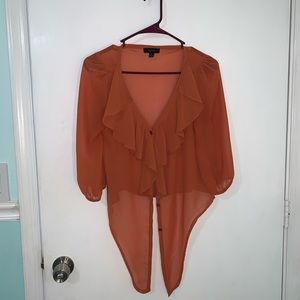 Orange but in a mesh crop top cover-up